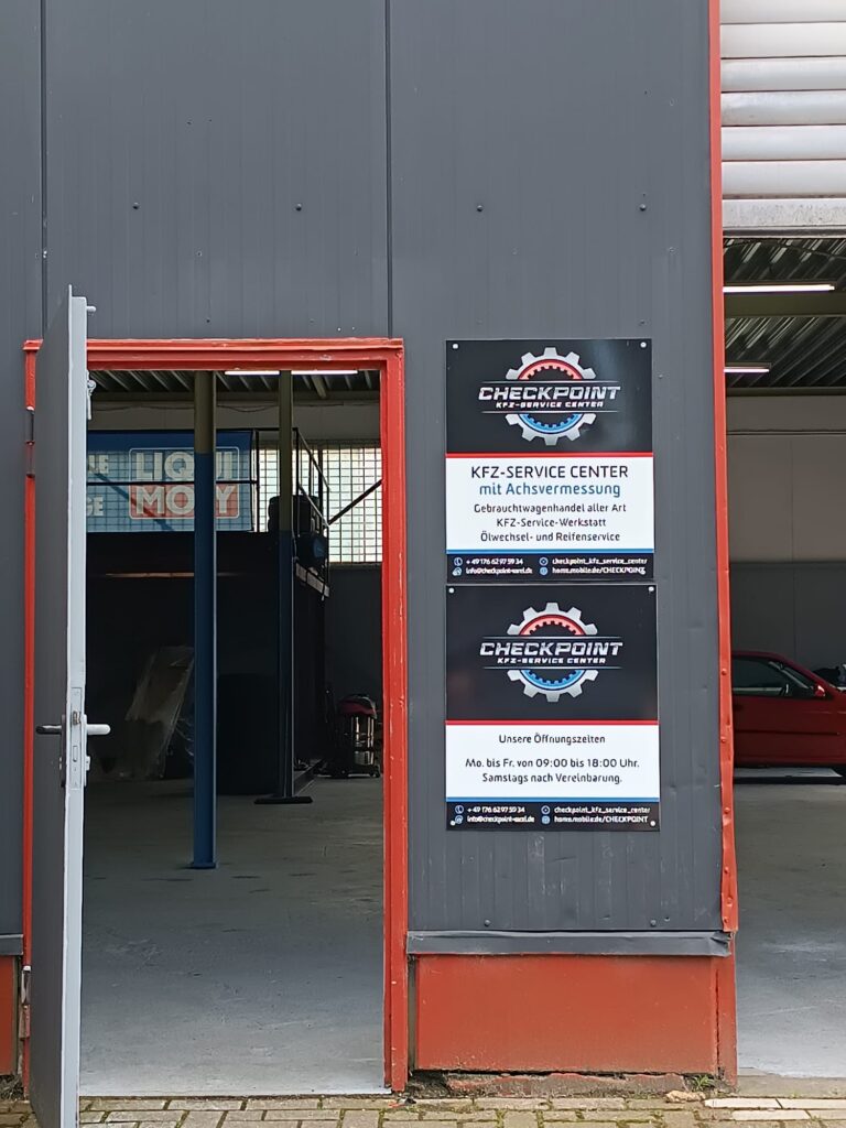 wandschild autowerkstatt, werbeschilder foliert